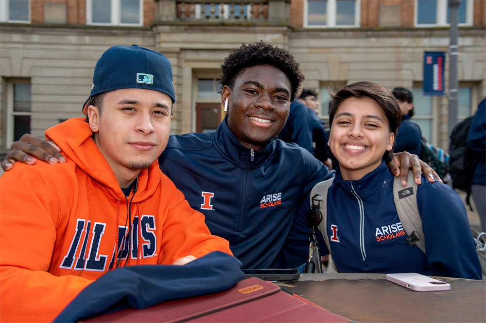 Students pose for a 2023 ARISE event